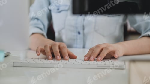 Preview: Programmer is using computer keyboard to write database program,Computer concept.