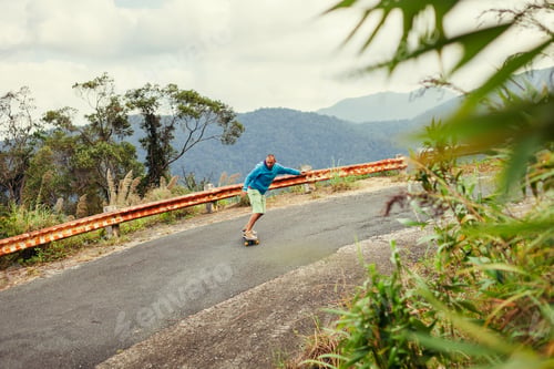 Preview: hipster man longboarding extremely in tropics