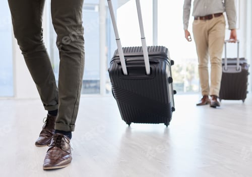 Preview: Shot of two businessmen on making their way to the airport from work
