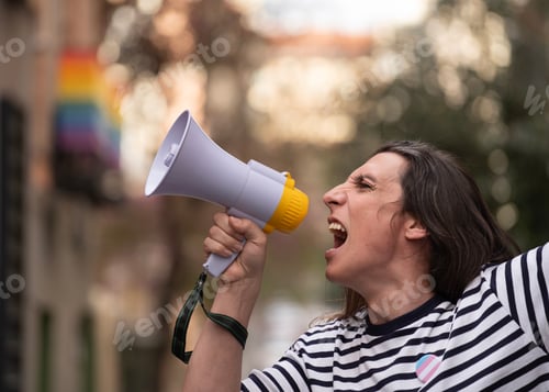 Preview: Trans woman is holding a megaphone and yelling to protest for homosexual social discrimination