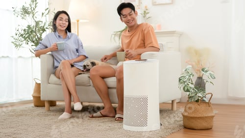 Preview: Young Couple Enjoy a Healthy Lifestyle With Pug and Air Purifier in Bright Living Space