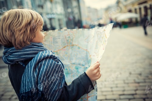 Preview: Boy with map