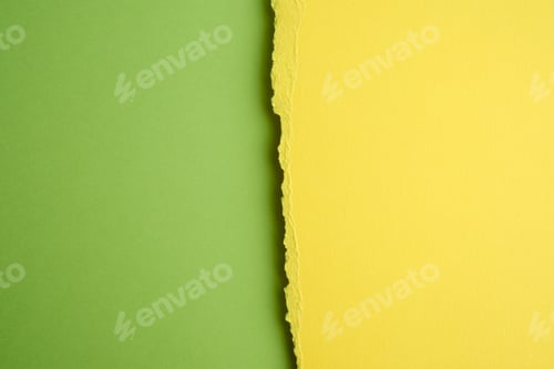 Preview: Yellow paper, green backdrop, close up