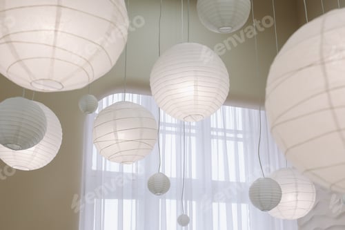 Preview: Beige paper lamps in modern interior. cozy home interior