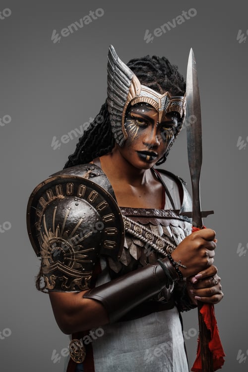 Preview: Warlike african woman with spear looking at camera
