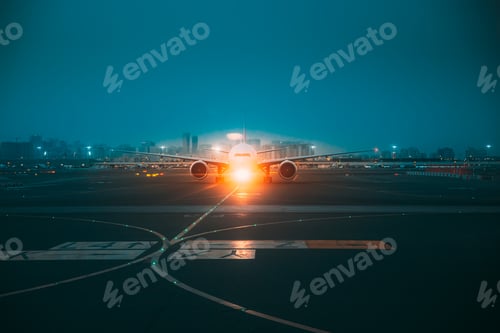 Preview: Aircraft Airplane Stand On Runway In Evening Night Time