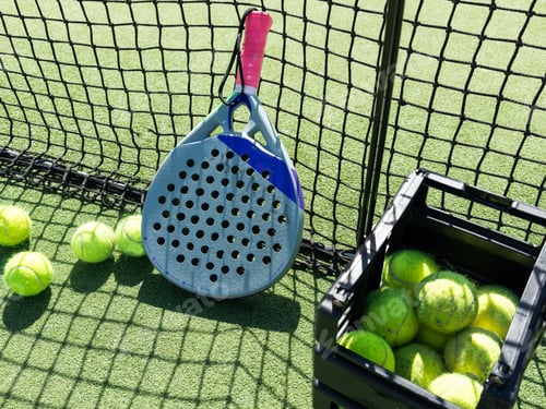 Preview: Paddle shovel rests on a basket of balls after a training on the track in court