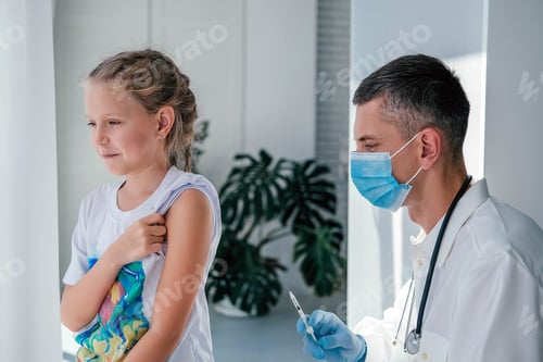 Preview: Doctor Gives Injection to Child Patient Indoors