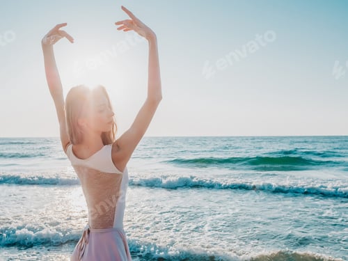 Preview: Graceful Woman Ballet Dancer on Beach at Sunrise