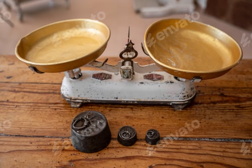 Preview: Weights and weighing scales on a bakery table