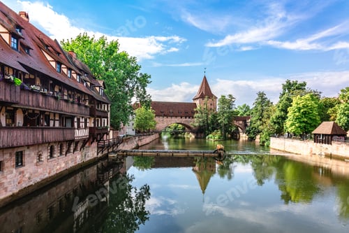 Preview: Colourful historic old town with half-timbered houses of Nuremberg. Bridges over Pegnitz river