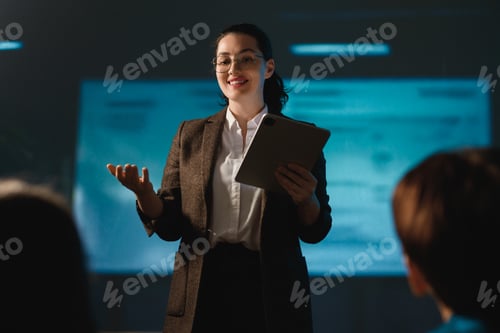 Preview: A woman is speaking on stage
