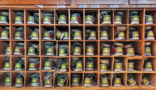 Preview: Bowling shoes stacked in cabinet