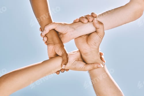Preview: Wrist hands, teamwork and diversity, support or community, trust or cooperation on blue sky. Collab