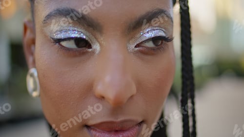 Preview: Dreadlocks lady looking camera evening street portrait. African american model