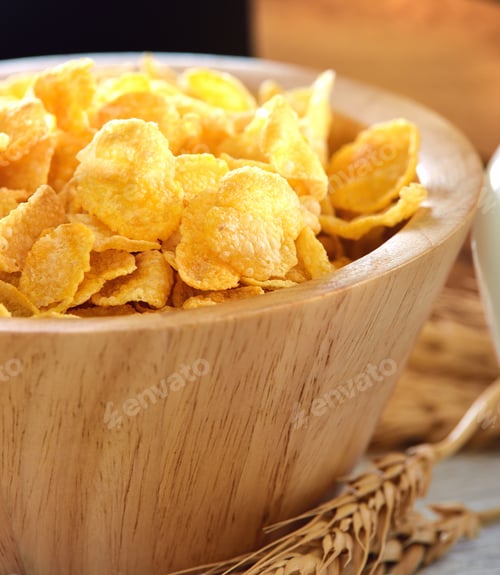 Preview: corn flakes in wood bowl