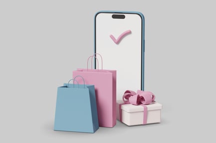 Preview: Smartphone with gift bags and present.