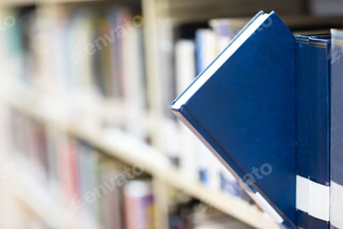 Preview: Book In A Bookshelf Standing Out At The Library