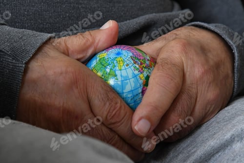 Preview: Hands holding a stress ball
