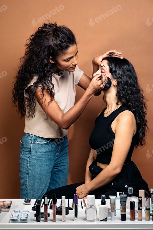 Preview: Model Getting her Make up Done