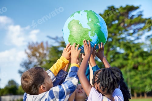 Preview: Children holding earth model for sustainable living concept