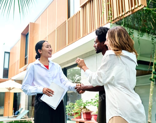 Preview: Portrait of real estate agent for a young couple property