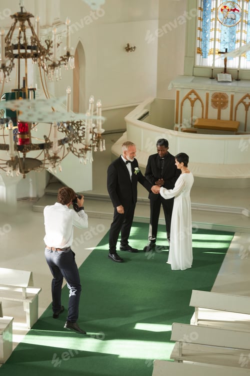 Preview: Wedding Ceremony in Church with Photographer Taking Pictures