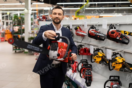 Preview: garden power tool shop manager offers red colored chainsaw