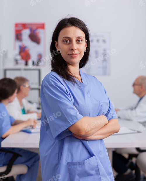Preview: Portrait of cardiologist woman with stethoscope looking into camera wearing medical uniform