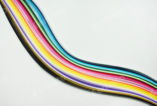 Preview: Rainbow doing with paper lines against a glitter white background