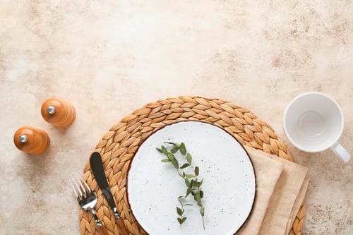 Preview: Vintage zero waste silverware. Rustic vintage set of white plate, wooden spoon and fork on napkin fo