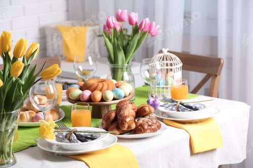 Preview: Festive Easter table setting with traditional meal at home