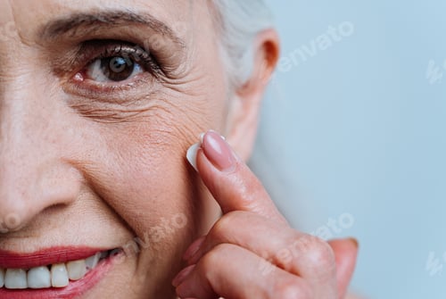 Preview: Beautiful senior woman posing on a photoshooting