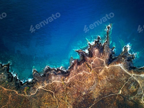 Preview: Top view of a deserted coast. Rocky shore of the island of Tener