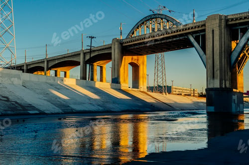 Preview: Sunlight on Los Angeles river embankment and 6th street bridge, Los Angeles, California, USA