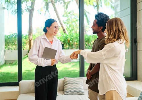 Preview: Young couple with areal estate agent