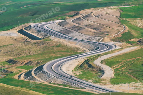 Preview: A winding road through a mountain pass