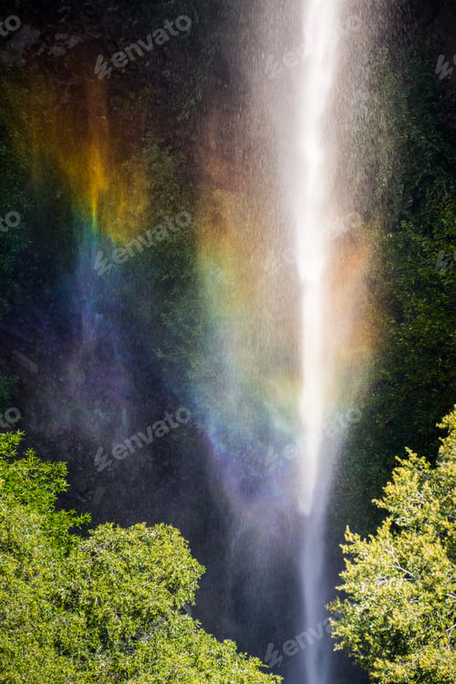 Preview: Rainbow appearing on a waterfall