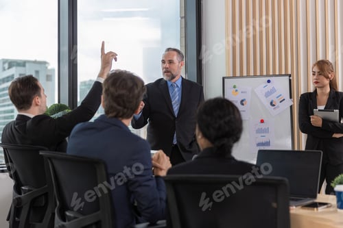 Preview: Diverse colleagues gather in brainstorm discuss statistics together.