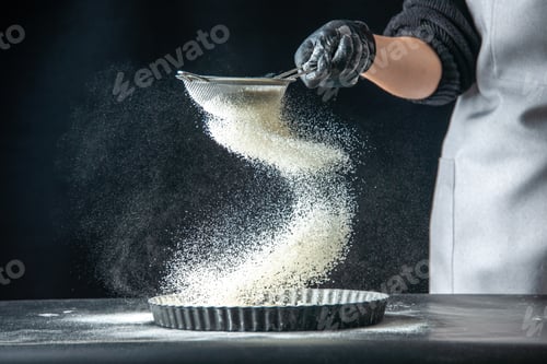 Preview: front view female cook pouring white flour into the pan on dark background egg job bakery hotcakes