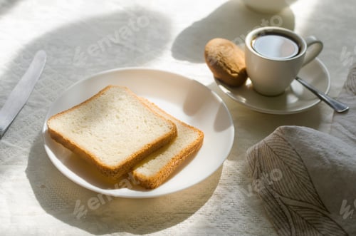 Preview: Breakfast with coffee, sweets and toast.