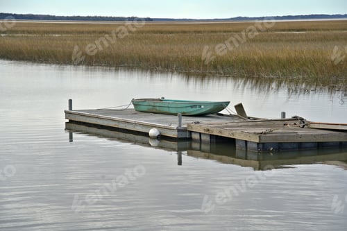 Preview: Row Boat on a floating wooden dock