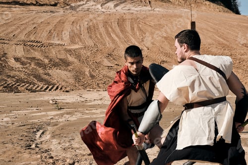 Preview: A Concept Photo Of A Roman Battle Of Two Warriors Of The Colosseum In Action With Aggressive