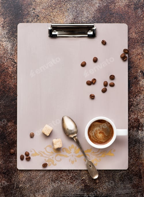 Preview: Vintage clipboard, cup coffee and coffee beans on dark background, top view