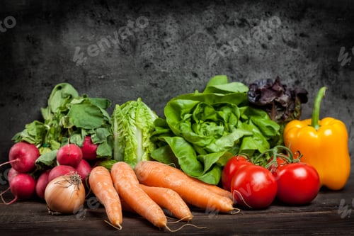 Preview: Fresh organic vegetables on rustic background