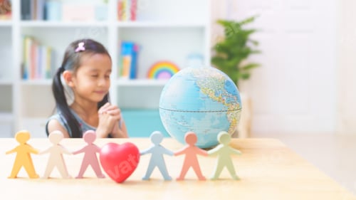 Preview: Blurred little girl praying for happiness and peaceful, concept of diversity, inclusion.