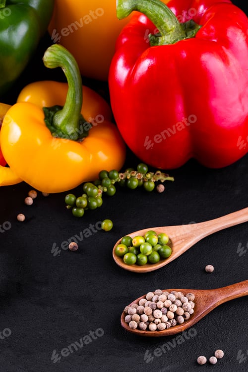 Preview: Three sweet peppers on a wooden background, Cooking vegetable salad