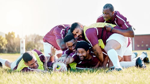 Preview: Sport, team and rugby by men in training, tackle and workout match at sports field outdoors. Divers