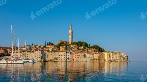 Preview: Stunning Rovinj coastline with historic buildings and reflections in the calm Adriatic Sea