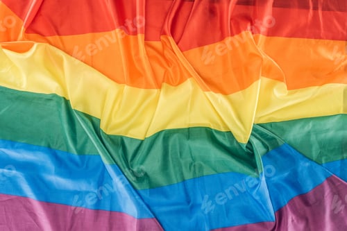 Preview: top view of creased rainbow flag, lgbt concept